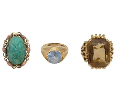Three dress rings9ct gold and quartz set single stone ring, within an open-work gallery, to trifuracted shoulders, tapering t