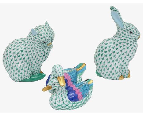Three Herend porcelain animal figuresa pair of ducks nesting together, a seated cat, and a seated rabbit, green scale, printe