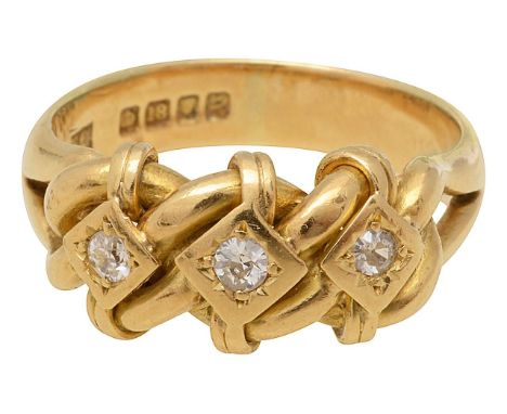 An 18ct gold diamond three-stone knot ring three round brilliant cut diamonds, set to a twisted knot mount, with bifurcated s