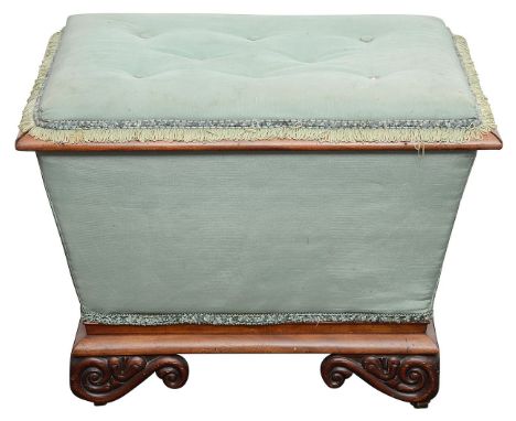 A William IV mahogany box stool / Ottomanof sarcophagus form, the hinged lid and sides upholstered in blue fabric, fitted int