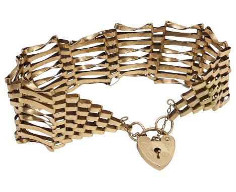 A 9ct gold gate bracelet stamped with hallmarks to link, with 9ct gold heart-padlock, stamped with hallmarks and safety chain
