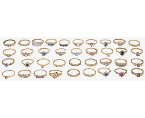 A large group of rings 18ct gold, ruby and diamond set ring, central oval mix-cut ruby, set between two round brilliant cut d