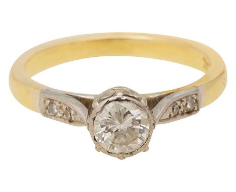 A diamond solitaire ringcentral round brilliant-cut diamond, bezel set to tapered diamond set shoulders, to a plain shank sta