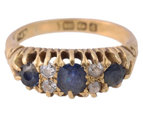 An 18ct gold sapphire and diamond-set graduated ringthe three slightly graduated mixed cut sapphires each separated by two ol