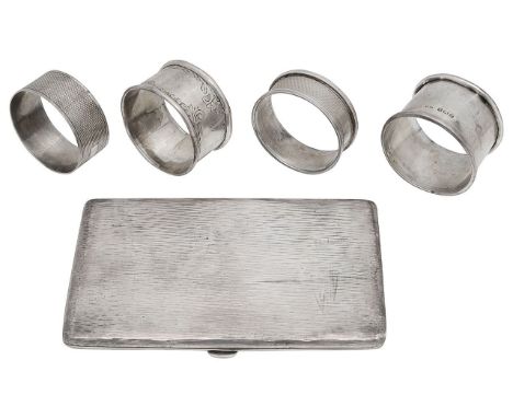 An Edwardian silver cigarette case and four napkin ringsfirst Chester 1906, William Nealerectangular with textured decoration