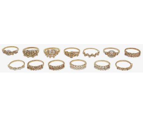 A selection of 9ct gold ringsof varying designs, set with colourless gems, stamped with hallmarks to shank (13) ring sizes P/
