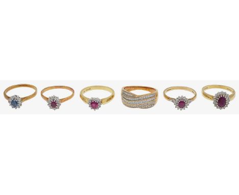 A group of 18ct gold ringsfour 18ct gold, ruby and diamond set cluster rings, of varying design, stamped with hallmarks to sh