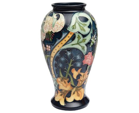 A modern Moorcroft 'Golden Lily Blue' pattern vase designed by Sally Tuffin adapted from a William Morris design, of inverted