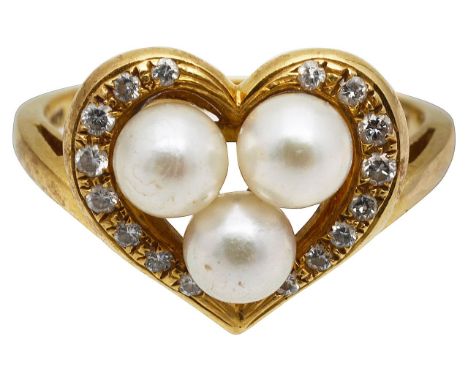 An 18ct gold heart ringset with three pearls (untested) to the centre, within a heart border, set with colourless gems, to a 