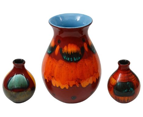 A large Poole Pottery Volcano vase and two bud vaseseach signed Poole England, (3)first height 25.5cm., second height 13cm.,C