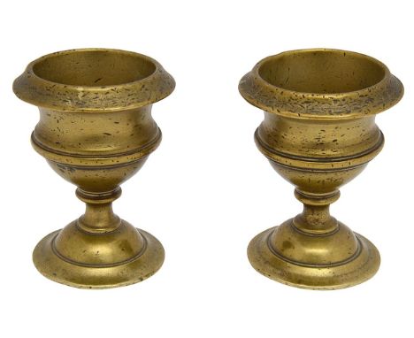 A pair of late 18th century polished bronze egg cups height 6.2cm.Condition:Commensurate with age 