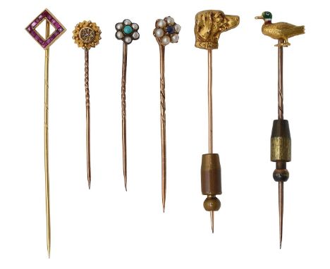 A collection of stick pinsincluding; ruby set stick pin, of geometric design, unmarked; duck stick pin, the head enamelled wi