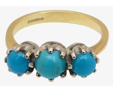A turquoise three stone ringfeaturing three turquoise cabochons, of slightly graduating design, claw set to a plain 18ct gold