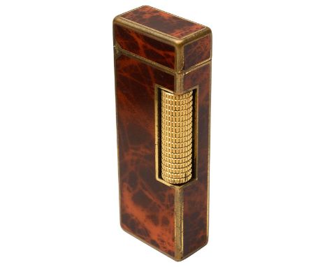 A Dunhill gold plated and tortoiseshell lacquer rollergas lighter in fitted caseheight 6.8cm.Condition:rubbing to gilt. untes