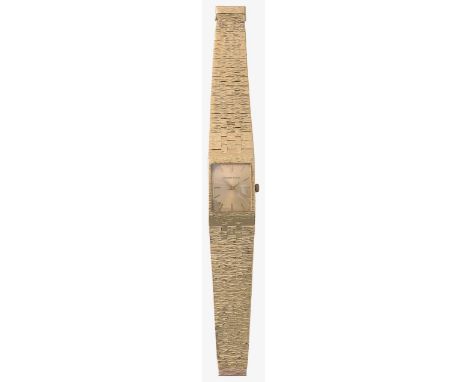 An Bueche-Girod 18K gold manual wind bracelet wristwatchthe rectangular gold coloured dial with baton numerals, with gold art