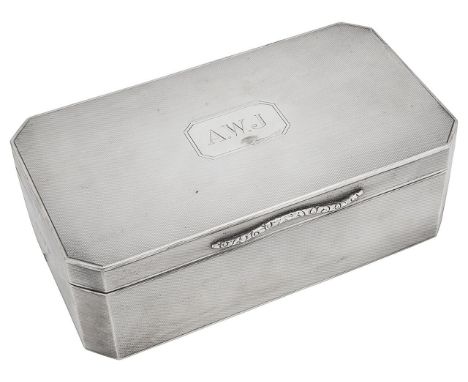 A George VI engine turned silver table cigarette boxBirmingham, 1936, Joseph Gloster Ltdrectangular with cut off corners, the