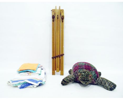 Folding artist's easel and a quantity of textiles including a knitted turtle 