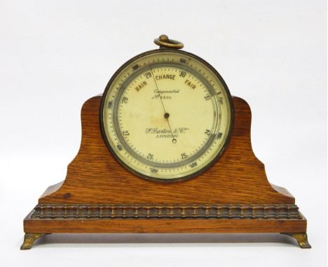 Circular brass travelling barometer marked F.Darton & Co, London, held within a fitted oak case, 11cm diameter 