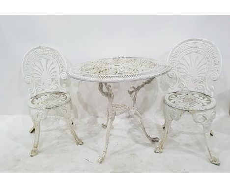 White painted cast metal circular garden table on tripod scroll supports and four matching chairs with anthemion backs (5)