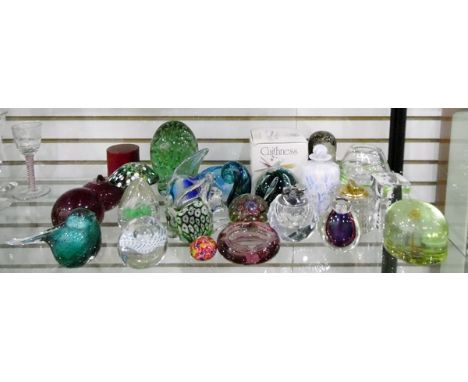 Large quantity of glass paperweights and other items including a green glass dump paperweight, a glass beaker in red leather 