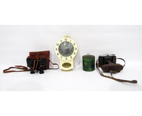 Pair of 8x binoculars in leather case, a Nettar camera in leather case, a bakelite wall clock and one other item (4) 