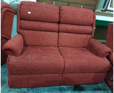 Modern suite comprising two seater sofa with two matching chairs, upholstered in dark red plush material 