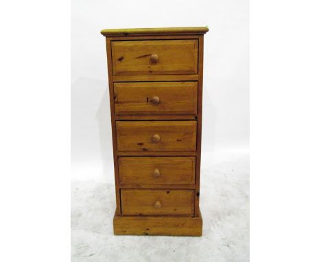 Modern pine chest of five drawers (a baton has been screwed onto the right hand side and a ceramic hook nailed onto the other