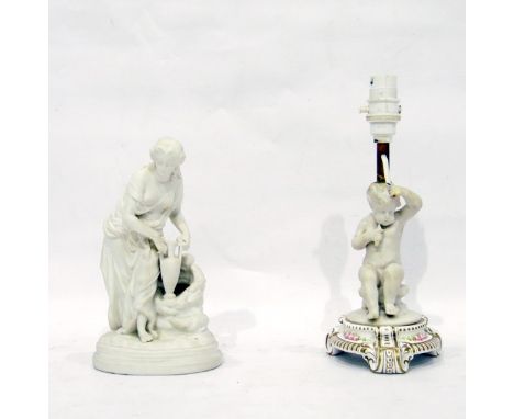 White bisque porcelain figure of a woman 'Rebecca' drawing water from a well, on oval base, 23cm high and a porcelain lamp wi