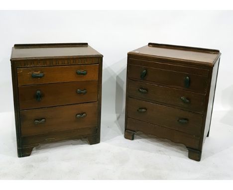 Pair of small chests of drawers, utility style, with shell metal handles, three drawers below, on square bracket supports, 62
