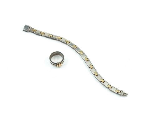 A TIFFANY AND CO SILVER BRACELET AND A TIFFANY AND CO SILVER RING (2)The bracelet in a panel shaped link design, with gilt co