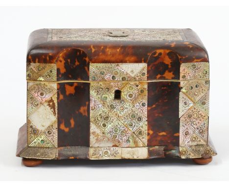 A REGENCY MOTHER OF PEARL INLAID TORTOISESHELL SHAPED RECTANGULAR TEA CADDYWith twin lidded interior, 20cm wide; 12cm deep; 1