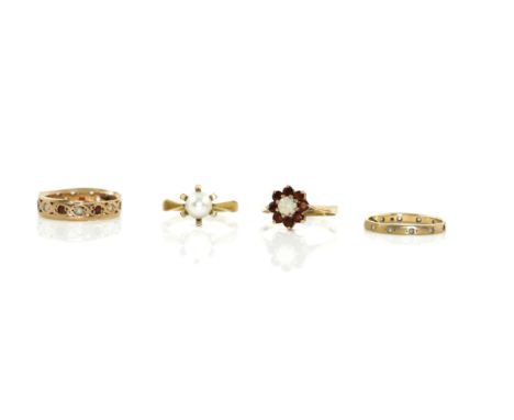 A 9CT GOLD OPAL AND GARNET NINE STONE CLUSTER RING AND THREE FURTHER RINGS (4)The opal and garnet nine stone cluster ring, si