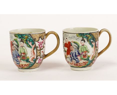 A PAIR OF UNUSUAL WORCESTER COFFEE CUPS (2)Circa 1770
Each painted with a seated Chinese man having his foot attended to with