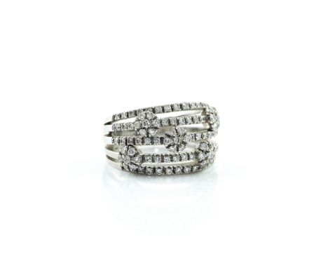 A WHITE GOLD AND DIAMOND RINGIn a multiple row design, with five cluster motifs and five rows of circular cut diamonds, detai