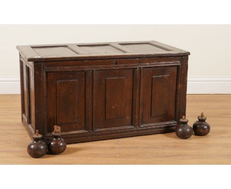 A 17TH CENTURY OAK TRIPLE PANEL COFFEROn later bun feet, 101cm wide; 52cm deep; 64cm high