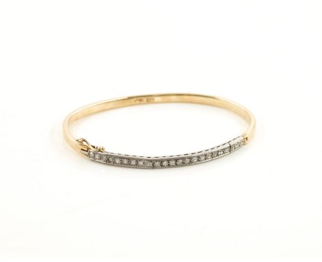 A GOLD AND DIAMOND SET OVAL HINGED BANGLEMounted with a row of eight cut diamonds, detailed 375 DJE, internal diameter 5.9cm,