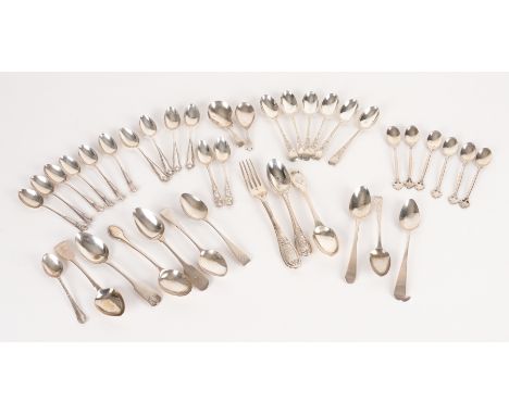 A GROUP OF SILVER FLATWARE (QTY)Comprising; two caddy spoons, a fork and a quantity of tea and coffee spoons, combined weight