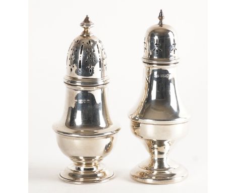 TWO SILVER SUGAR CASTERS (2)The first example London 1927, height 18cm, the second example, Birmingham 1975, height 18cm, com