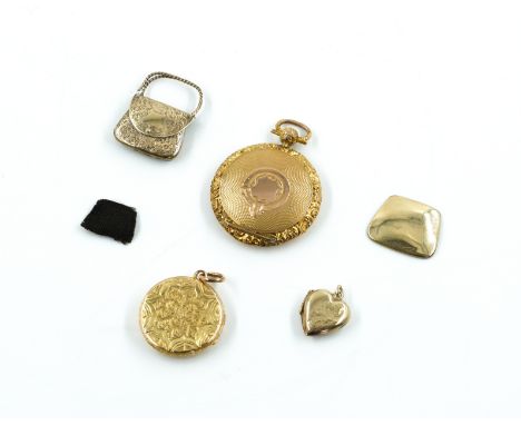A GROUP OF FOUR PENDANT LOCKETS (4)Comprising; a Victorian circular pendant locket, glazed with a hairlocket within, the fron