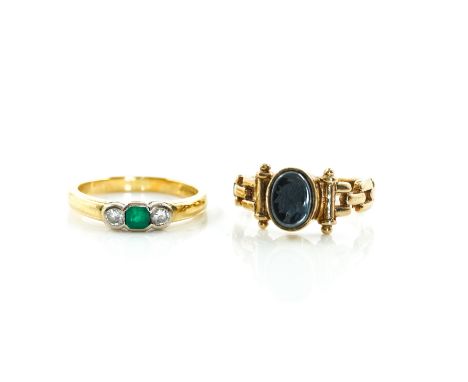 AN 18CT GOLD, EMERALD AND DIAMOND THREE STONE RING AND A 9CT GOLD AND HAEMATITE RING (2)The first ring mounted with the squar