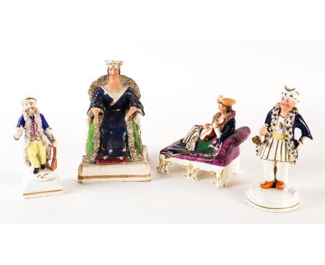 FOUR STAFFORDSHIRE FIGURES (4)1840's
Comprising; a figure of Queen Victoria, seated on a square base, wearing a crown, ermine