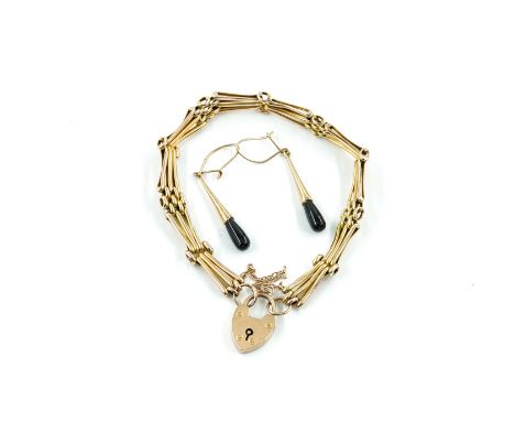 A GOLD GATE BRACELET AND A PAIR OF PENDANT EARRINGS (2)The bracelet in a bar and oval link design, detailed 9 C, with a gold 