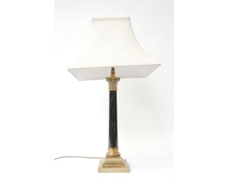 A GILT-METAL MOUNTED BLACK FOSSIL MARBLE CORINTHIAN COLUMN TABLE LAMPModern
The plain tapering column mounted with Corinthian