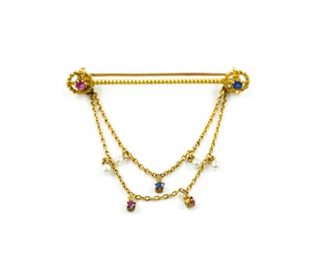 A GOLD, RUBY, SAPPHIRE AND SEED PEARL BAR BROOCH WITH PENDANT CHAINSOf twisted form, length 4.6cm, gross weight 3 gms