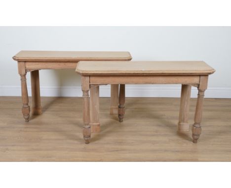 A PAIR OF BLEACHED OAK CANTED RECTANGULAR CONSOLE TABLES (2)On turned supports, 122cm wide; 34cm deep; 72cm highCondition rep
