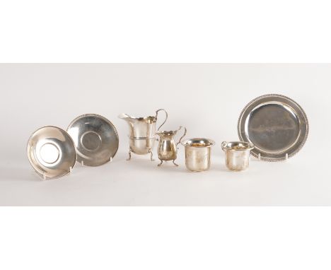 A GROUP OF SILVER (7)Comprising; a pair of cups and saucers, one cup and two saucers are Birmingham 1923, the other cup Birmi