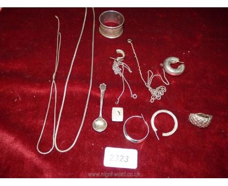 A quantity of scrap silver including a napkin ring, silver necklaces, odd earrings and mustard spoon.