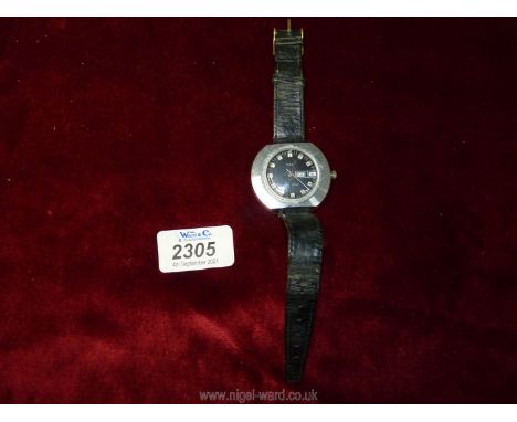 A Timex water resistant gentleman's watch, made in Great Britain, serial no. 27852 02774, complete with service receipts.