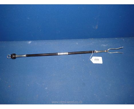 A Silver and ebonised handled toasting Fork/tongs, London, maker A &amp; SH, possibly 1995.