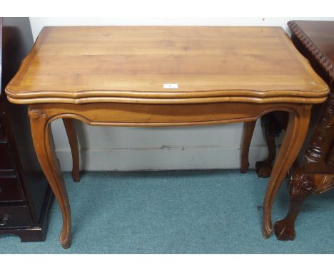 A reproduction fold over card table Condition Report: Available upon request